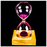Pink wood + glass + iron powder sand iron flowering magnetic hourglass with packaging hourglass 13.5 * 5.5cm wooden seat 8 * 8 *